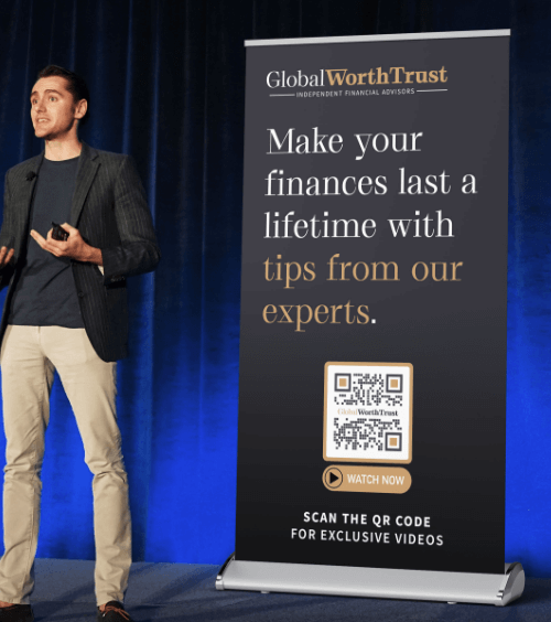 Un banner ad una conferenza con un QR Code che mostra video esclusivi di una società di consulenza finanziaria.